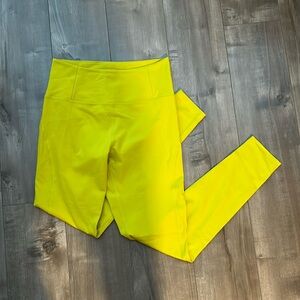 High rise chartreuse leggings by Girlfriend Collective in medium